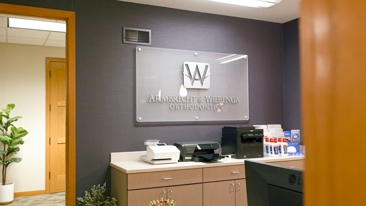 Armbrecht & Wierenga Orthodontics practice sign inside our Grand Rapids, MI office