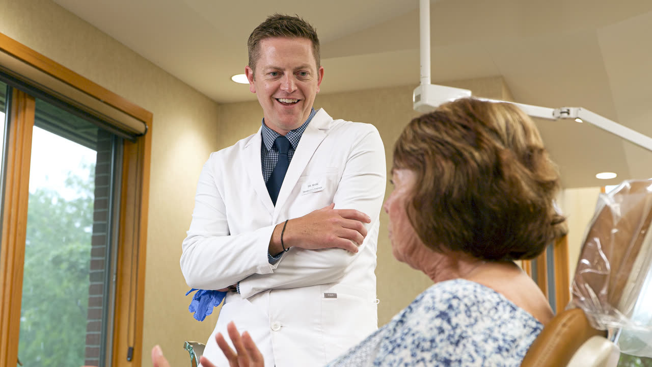 Orthodontist consulting with a patient at our Grand Rapids, MI office