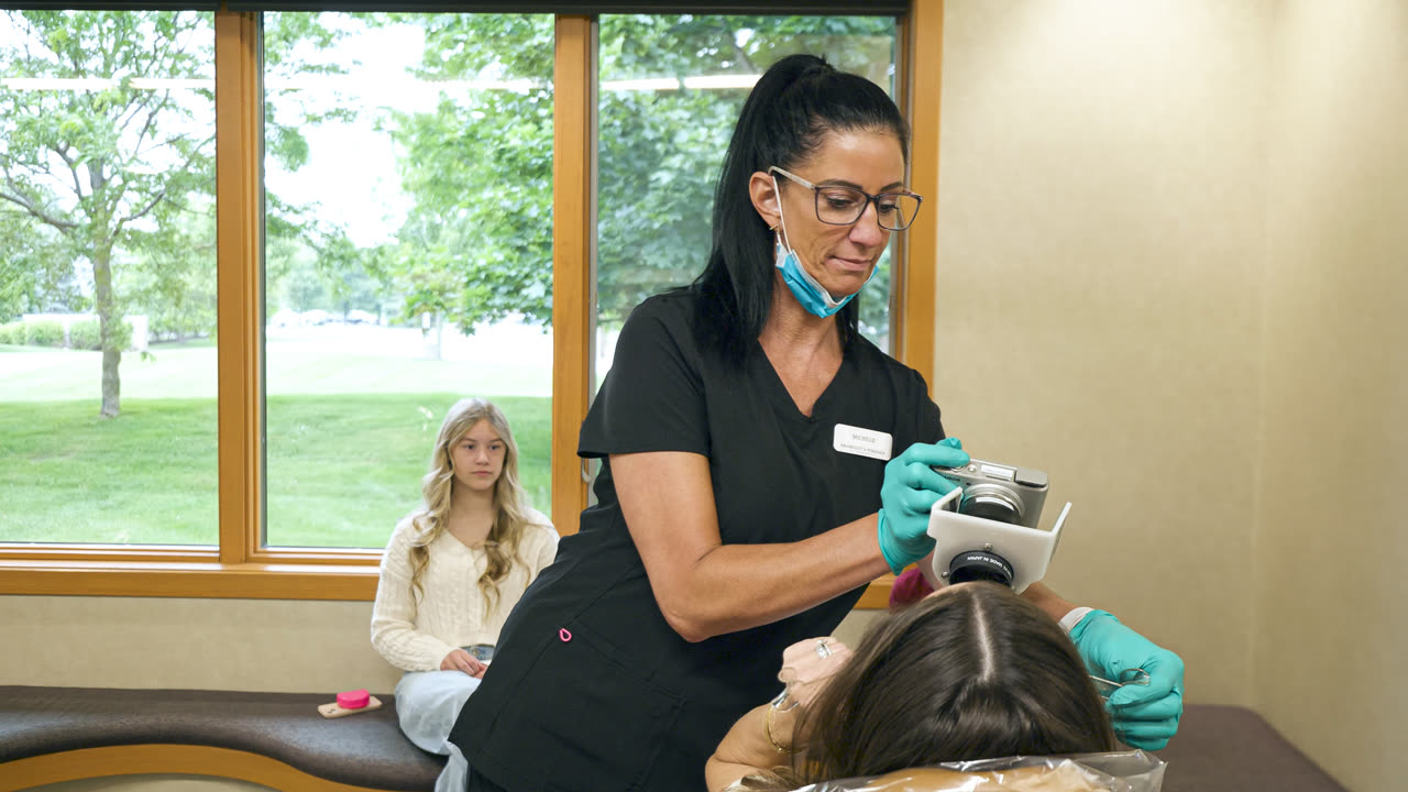 Teen Invisalign® patient at our Grand Rapids, MI orthodontic office
