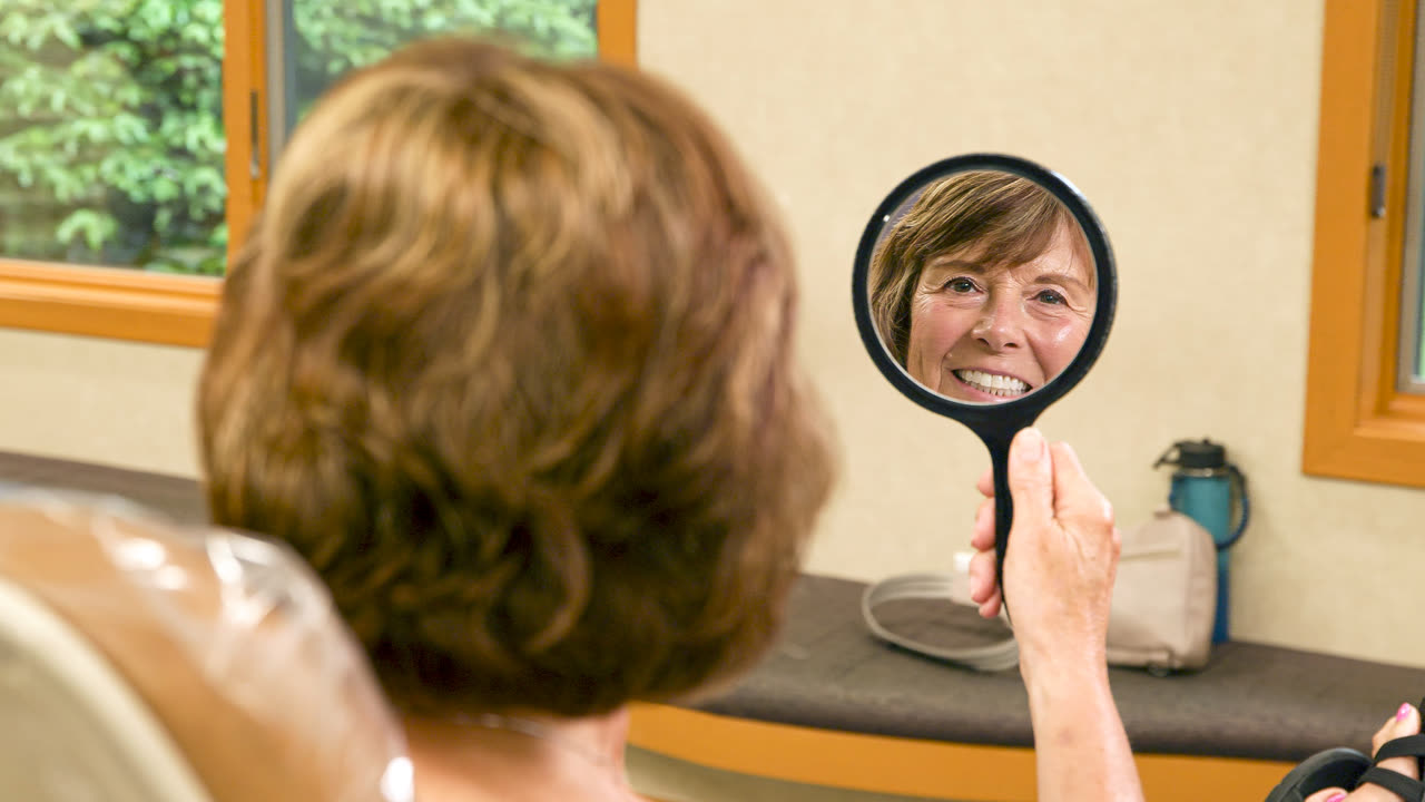 Orthodontist explaining treatment to a patient at our Grand Rapids, MI office